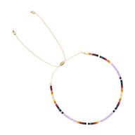 Bracelet ajustable en perles japonaises multicolores style Kumiko avec fermoir doré.