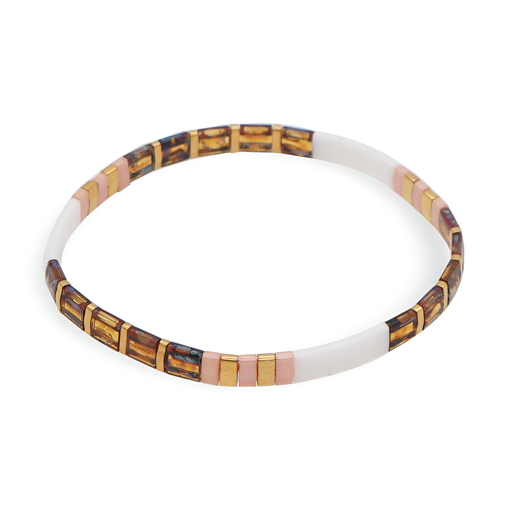 Bracelet Mitsuko en perles japonaises blanches, roses et marron avec motifs géométriques.