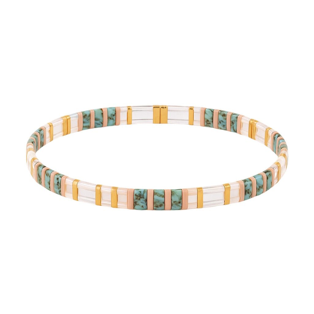 Bracelet fin en perles bleues et transparentes avec intercalaires dorés, style Neyali pour femme.