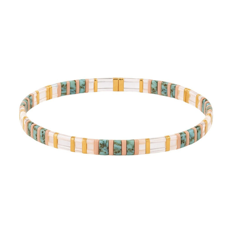 Bracelet fin en perles bleues et transparentes avec intercalaires dorés, style Neyali pour femme.