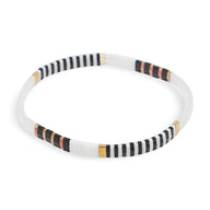 Bracelet femme rigide perles blanches avec motifs rayés noirs, dorés et saumon.