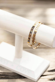 Bracelet femme en perles marron et dorées, style élégant et minimaliste, collection Tatoa.