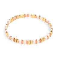 Bracelet femme ligne perles blanches, or rose et or jaune style Tomoe, design élégant.