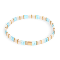 Bracelet femme en perles bleues et beige style Yumiko, design minimaliste et élégant.