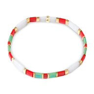 Bracelet perles japonaises blanc, rouge, vert et or style Noël pour femme.