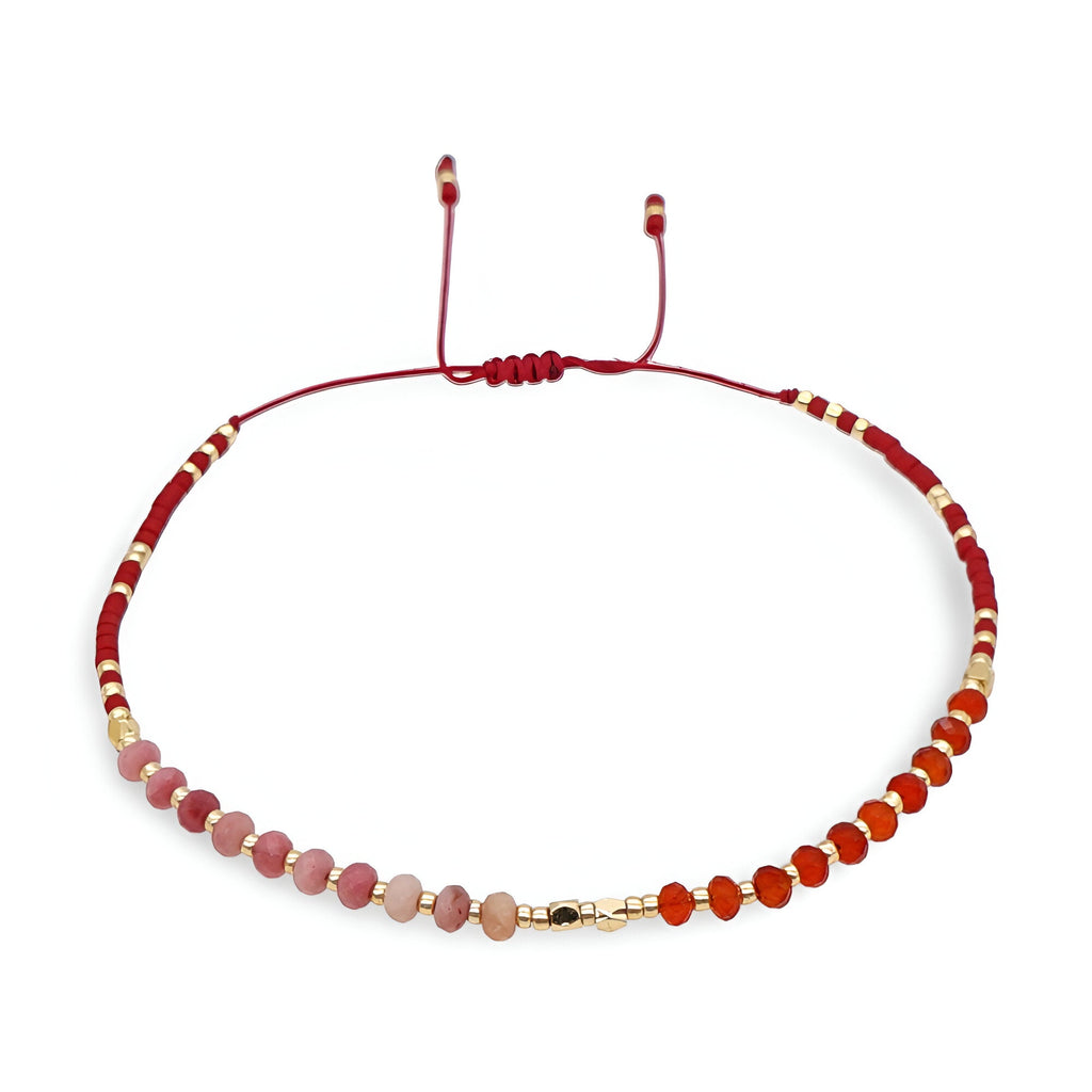 Bracelet femme perles heishi rouges et roses avec cristaux et fermoir coulissant doré.