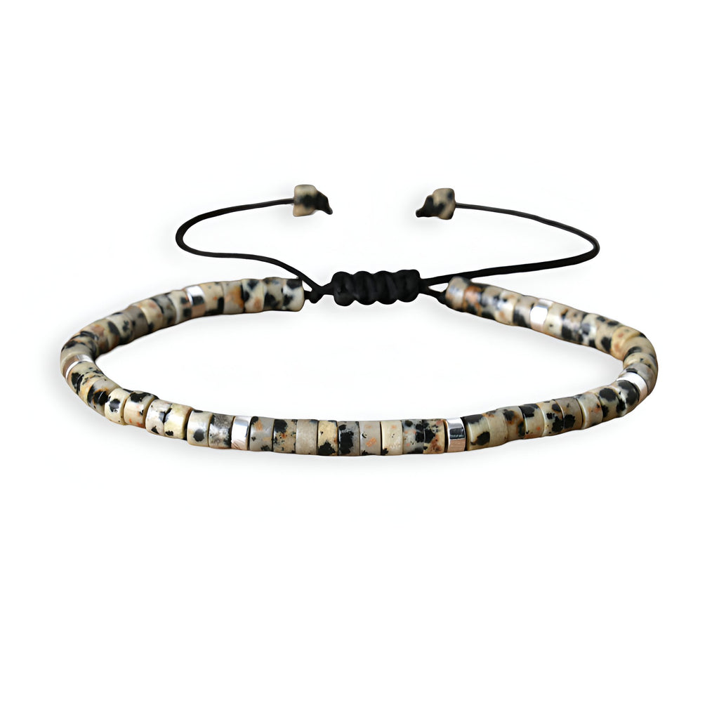 Bracelet mixte perles heishi jaspe dalmatien blanc beige noir cordon noir ajustable.