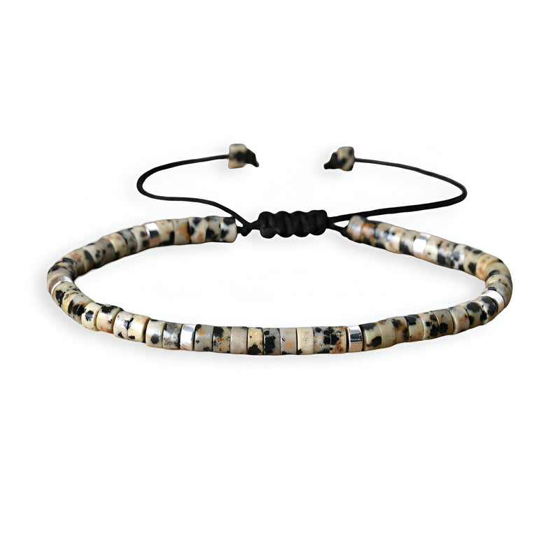 Bracelet mixte perles heishi jaspe dalmatien blanc beige noir cordon noir ajustable.