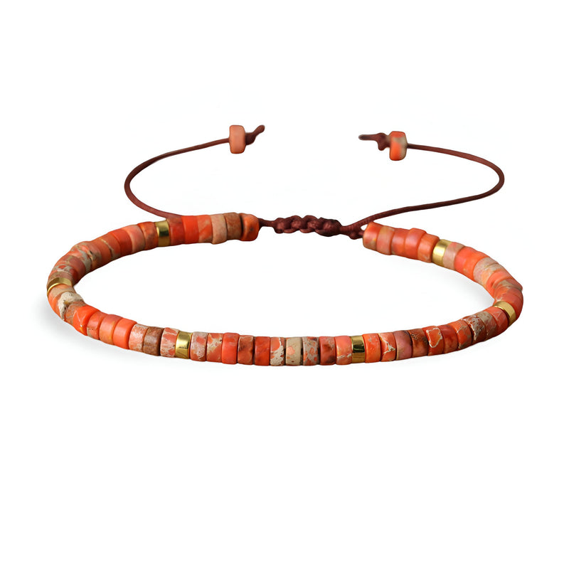 Bracelet mixte en perles heishi jaspe impérial orange avec cordon ajustable marron.