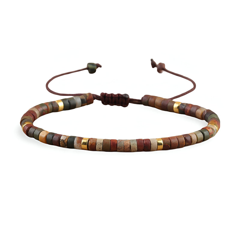 Bracelet mixte en perles heishi jaspe marron avec détails dorés et cordon ajustable.