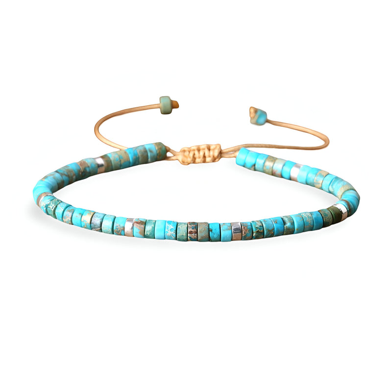 Bracelet ajustable en perles heishi turquoise avec fermeture en corde beige, style mixte.