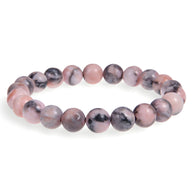 Bracelet élastique femme en perles rondes roses et noires, modèle Maia en jaspe zébré.