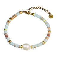 Bracelet pour femme en perles de pierre Shoushan multicolores avec perle centrale nacrée et détails dorés.