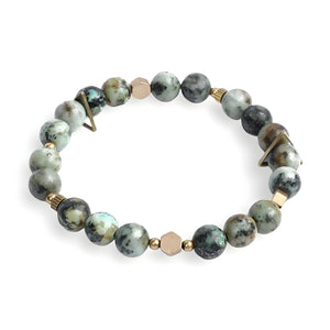 Bracelet mixte en pierres naturelles jaspe zébré avec perles dorées et fermoir doré.