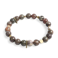 Bracelet mixte en jaspe rouge naturel avec perles rondes et détails en métal doré.