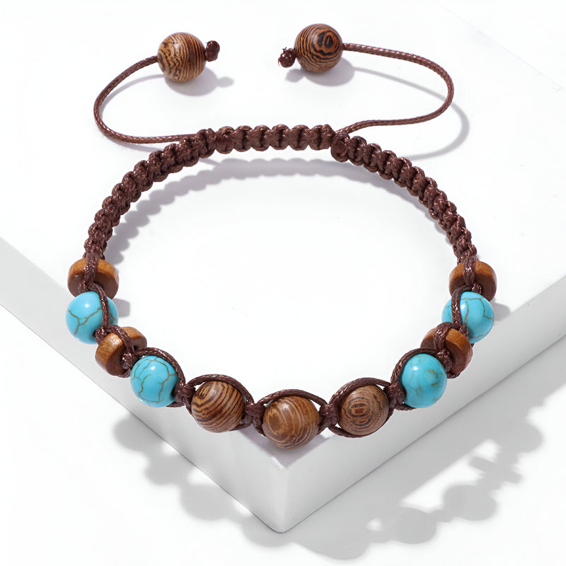 Bracelet mixte réglable en perles de bois et pierre turquoise, cordon marron tressé.