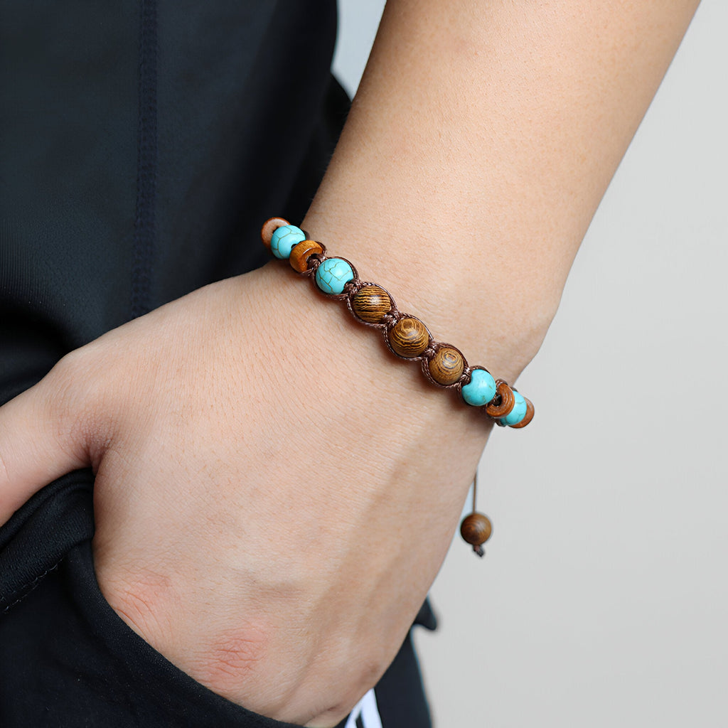 Bracelet mixte en bois et pierres naturelles œil de tigre et turquoise, style perles lisses.