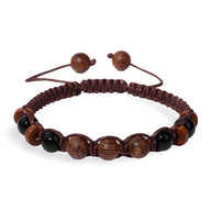 Bracelet mixte en bois foncé avec pierres naturelles brun et noires ajustable par nœuds coulissants.