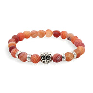 Bracelet mixte en pierres agate orange avec breloque hibou protecteur en métal argenté.