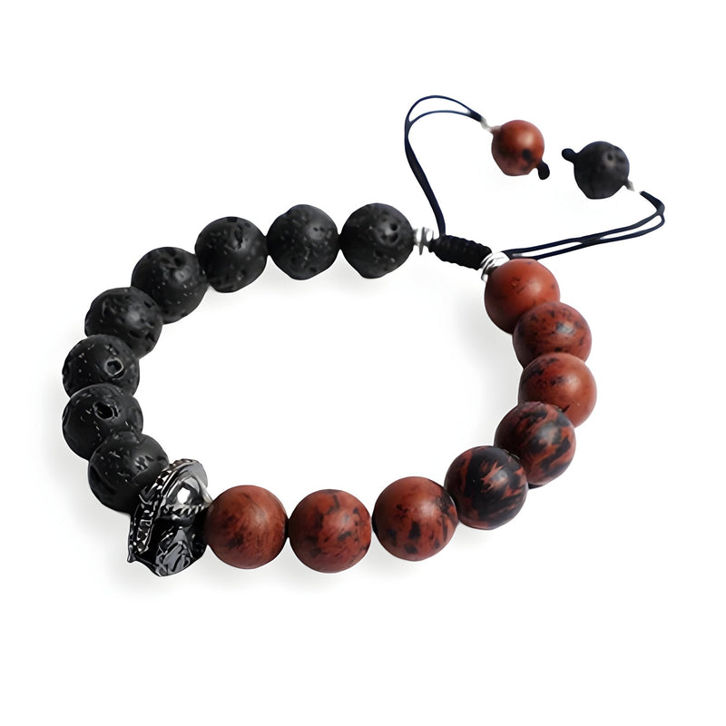 Bracelet pour homme avec perles en pierre volcanique noire et jaspe rouge, ornement spartiate en métal noir.