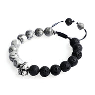 Bracelet homme en pierres volcaniques noires et jaspe gris avec ornement métal argenté style spartiate.