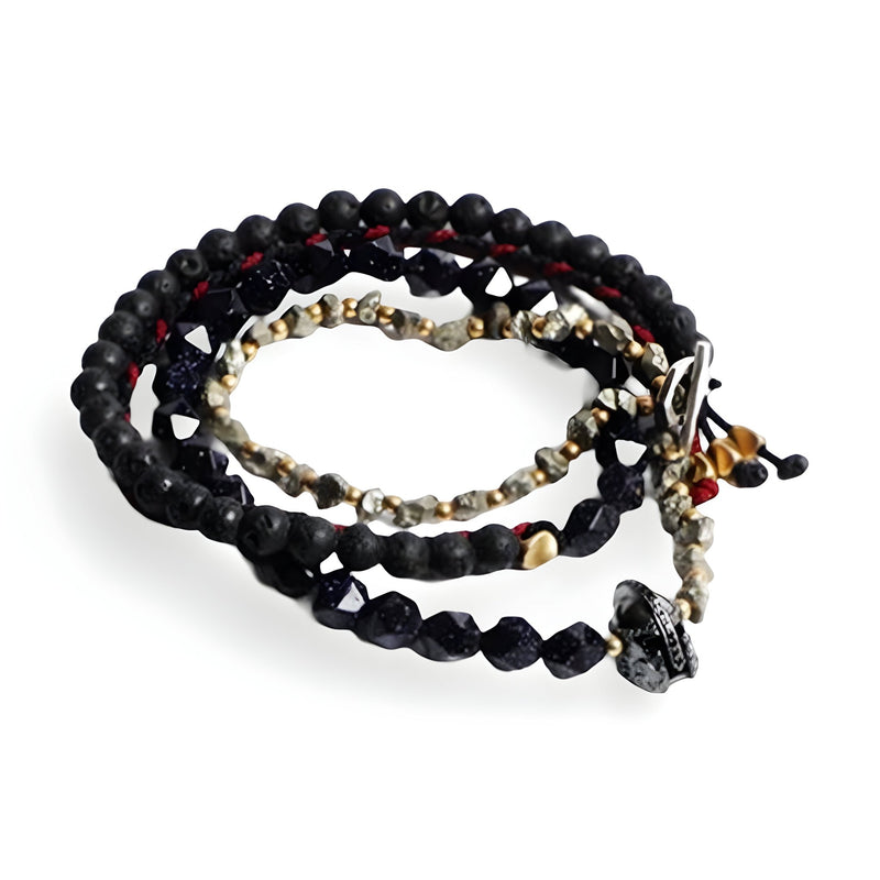 Bracelet homme pierres naturelles noires et rouges avec ornement spartiate en métal argenté.