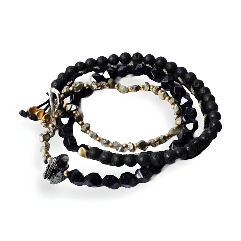 Bracelet homme en pierres noires avec ornement spartiate en métal argenté, style enfilade multiple.