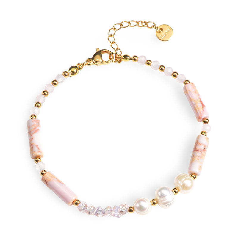 Bracelet femme avec perles blanches, pierres naturelles rose pâle et petites perles dorées, fermoir ajustable.