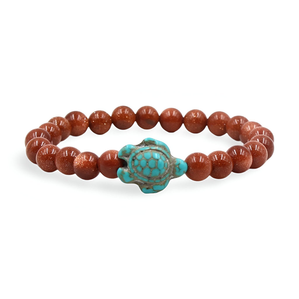 Bracelet mixte en perles marron avec tortue turquoise centrale en pierre naturelle.