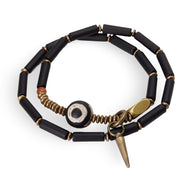 Bracelet femme en pierres d'agate noires cylindriques et cuivre, avec pendentifs rond et conique.