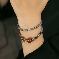 Bracelet femme double rang en pierres bleu jaspe et agate, perle rouge et fermoir cuivre.