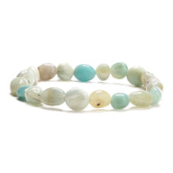 Bracelet en pierres naturelles asymétriques multicolores, tons blanc, beige, vert pâle et bleu ciel, finition lisse et.