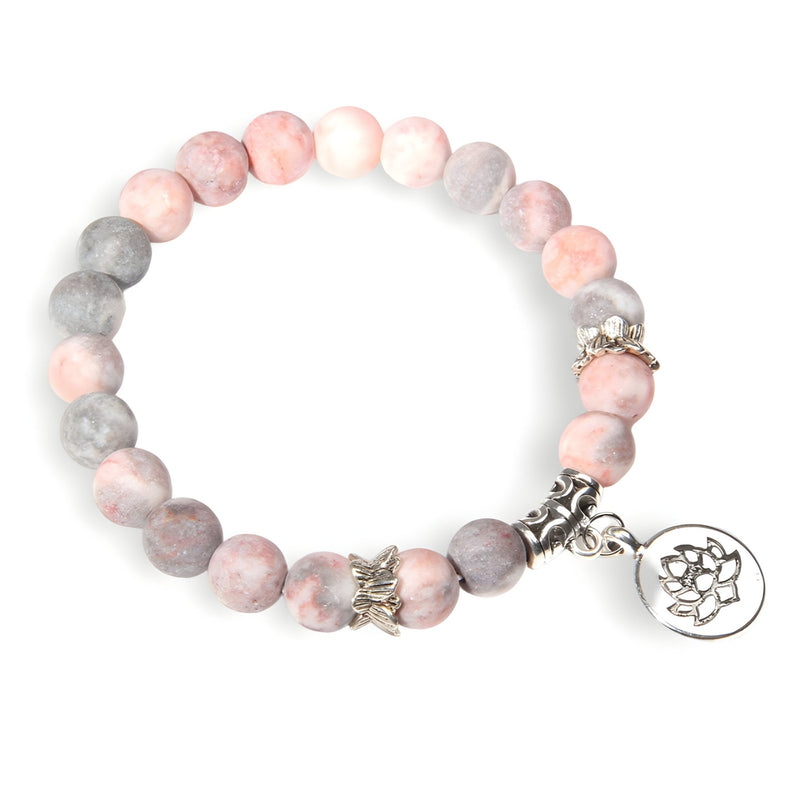 Bracelet mixte en perles rondes roses et grises, charm fleur de lotus argenté, modèle Kai.
