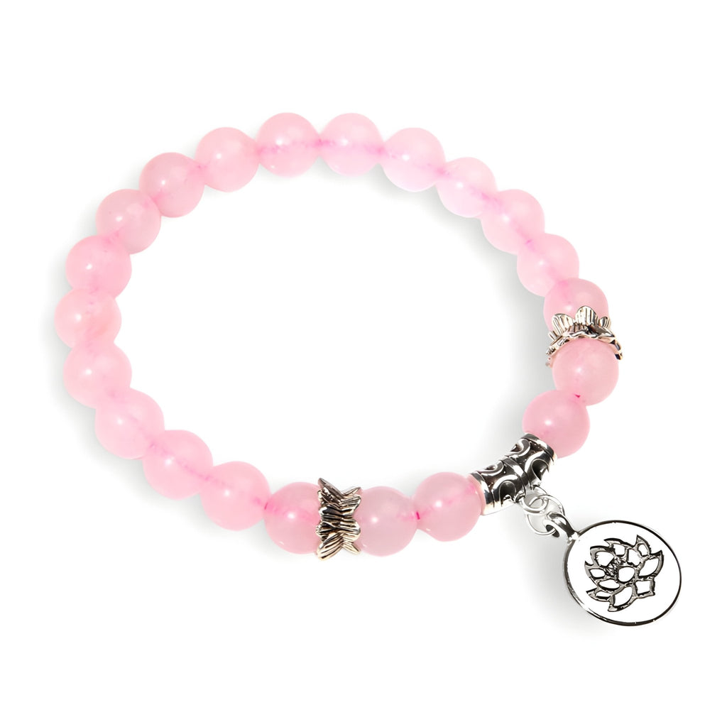 Bracelet mixte en quartz rose avec perles rondes et charm fleur de lotus en métal argenté.
