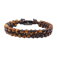 Bracelet double rang en œil de tigre avec cordon marron et fermoir noir gravé.