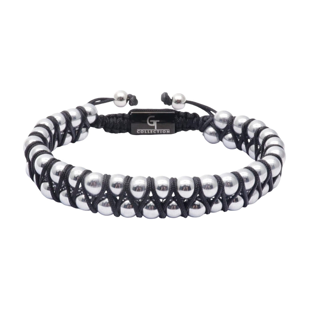 Bracelet double rang en pierres naturelles noires et gris argent, encordé style Tamal avec fermoir ajustable.