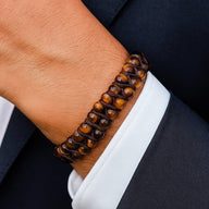 Bracelet double rang en pierres naturelles œil de tigre, cordage marron foncé, style masculin élégant.