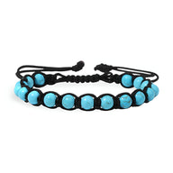 Bracelet mixte entrelacé en corde noire avec perles turquoise naturelles lisses.