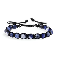 Bracelet mixte Corey en pierres tanzanites bleues entrelacées d'une corde noire avec nœuds ajustables.