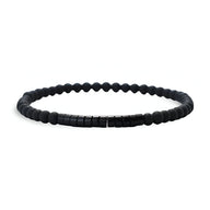 Bracelet fin pour homme en pierres naturelles noires mates avec perles cylindriques noires brillantes.