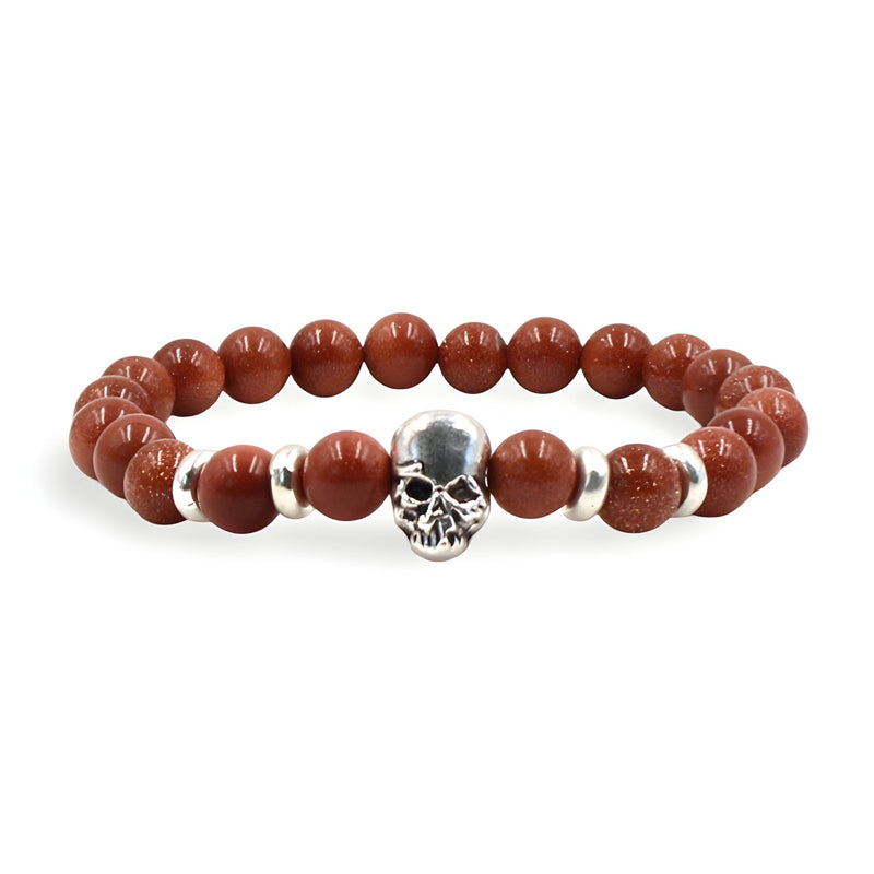 Bracelet en pierres naturelles rouges avec tête de mort argentée et anneaux argentés, modèle Ardi.