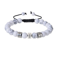 Bracelet Valen en pierres naturelles albâtre avec triple plaques gravées et cordon noir ajustable.