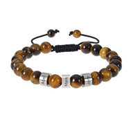 Bracelet en perles d'œil de tigre avec trois plaques argentées et fermeture ajustable noire.