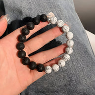 Bracelet bi-colore en pierres volcaniques noires et blanches marbrées, style mixte, modèle Côme.