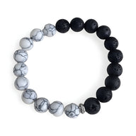Bracelet mixte en pierres volcaniques noires et blanches, perles rondes, style bi-colore.