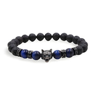 Bracelet homme en pierres volcaniques noires et perles œil de tigre bleu avec tête de loup métallique gris anthracite.