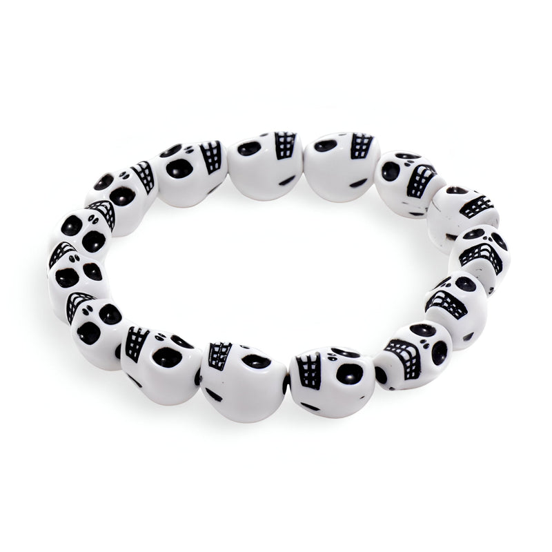 Bracelet homme en résine blanche avec crânes noirs assemblés style Spooky.