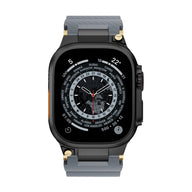 Bracelet silicone gris technique avec détails or pour Apple Watch, modèle Wagner, ajustable.