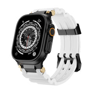 Bracelet Apple Watch en silicone blanc avec détails or, fermoir noir, style technique ajustable.