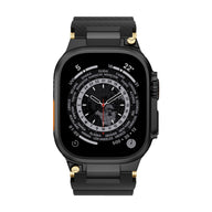 Bracelet Apple Watch en silicone noir à détails or, design technique, modèle Wagner, ajustable.